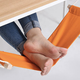 Illustration for article titled An Under-Desk Hammock For Your Feet Is the Best Office Upgrade